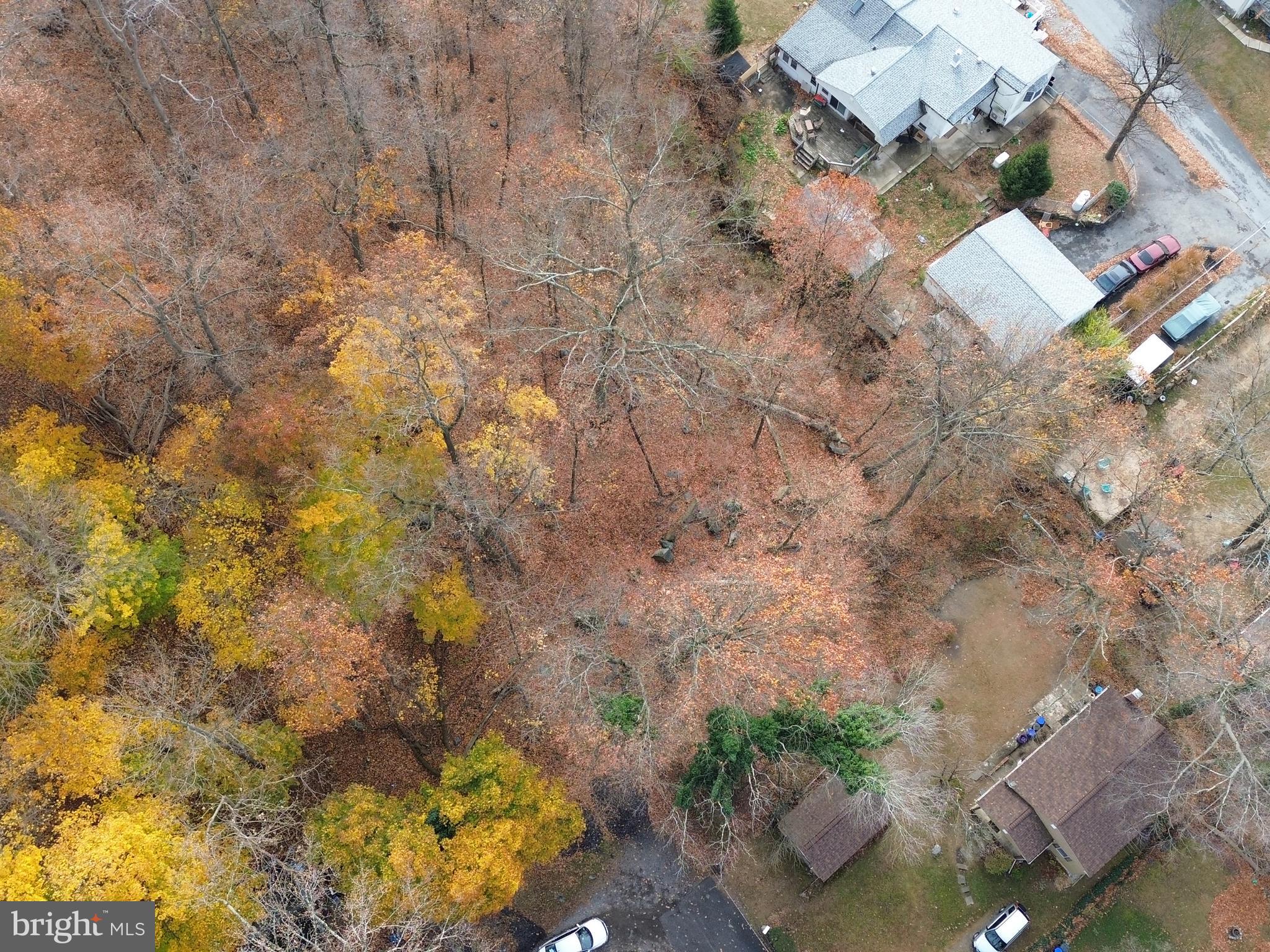 an aerial view of residential house with outdoor space