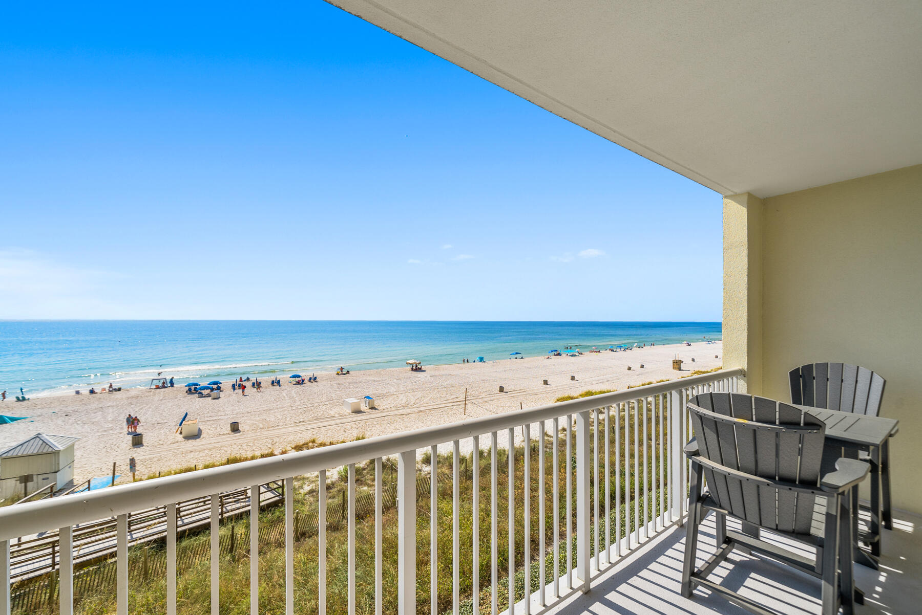 a view of a balcony with an ocean view