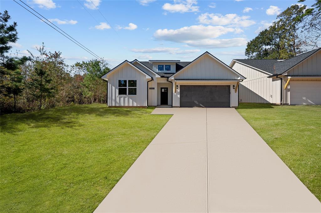 a house with garden in front of it