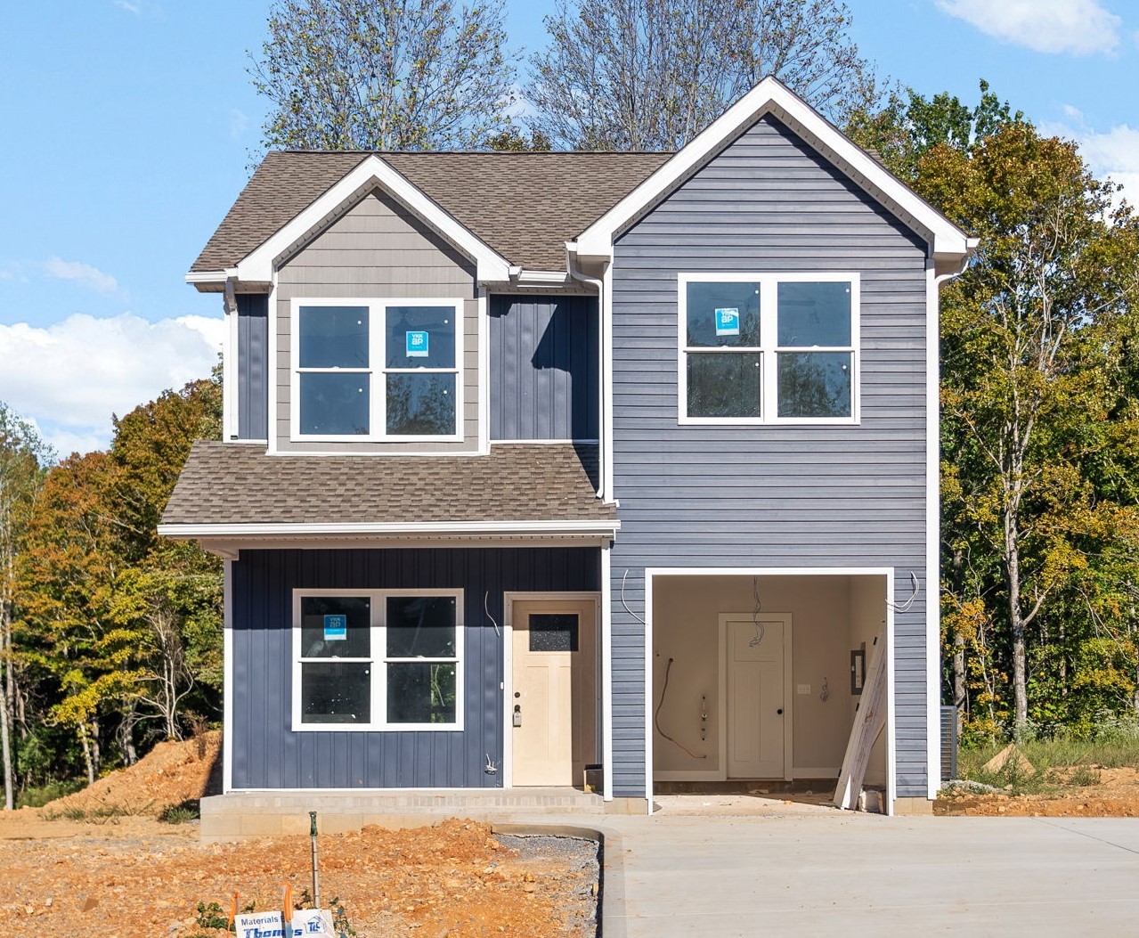 front view of a house and a yard