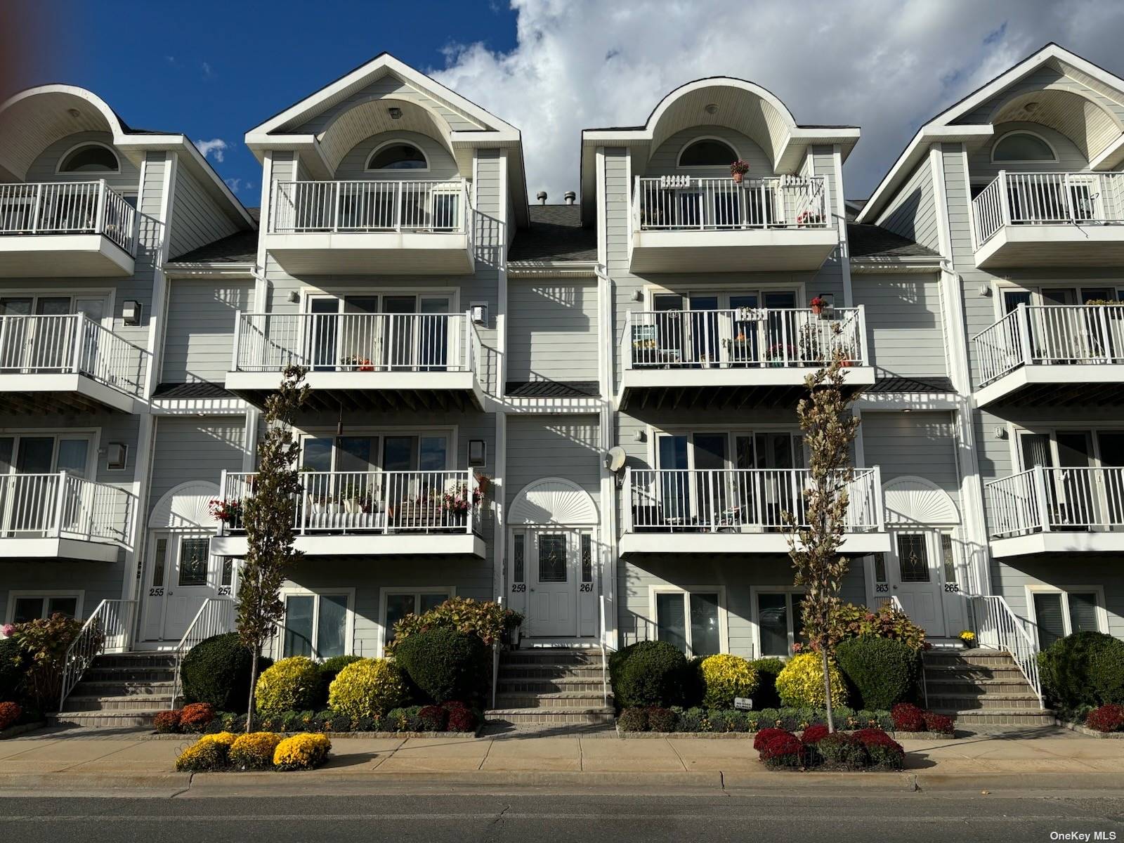 a front view of multi story residential apartment building