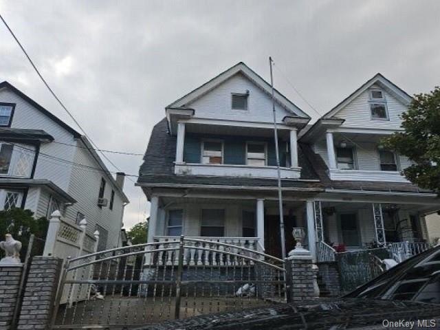 View of front of property featuring covered porch