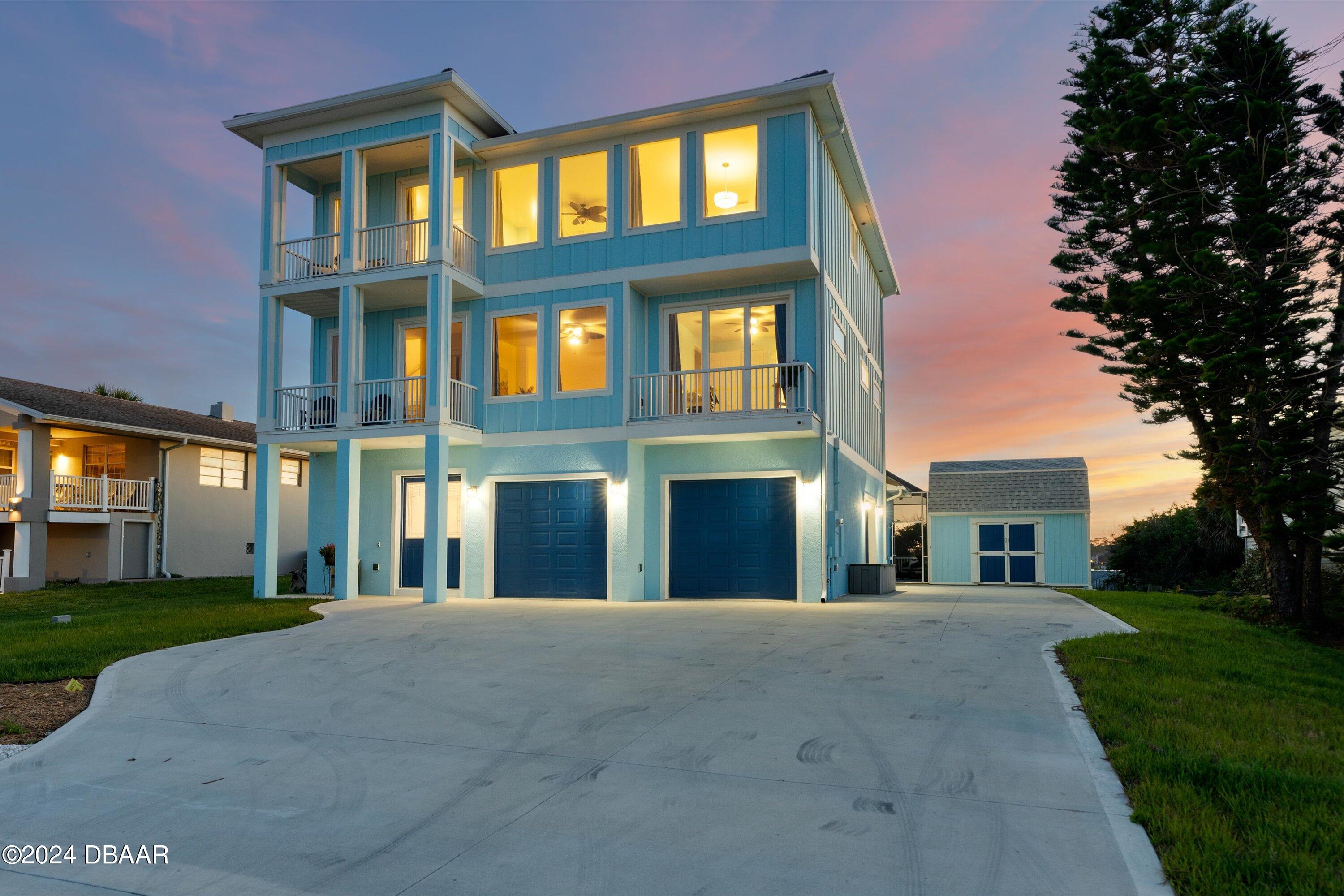 a view of a building with a yard