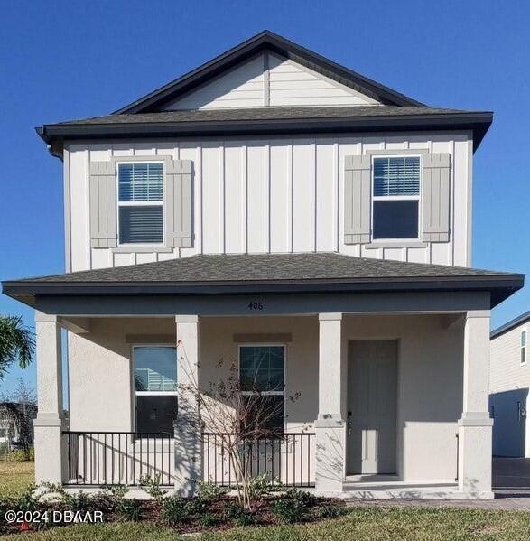 a front view of a house with yard