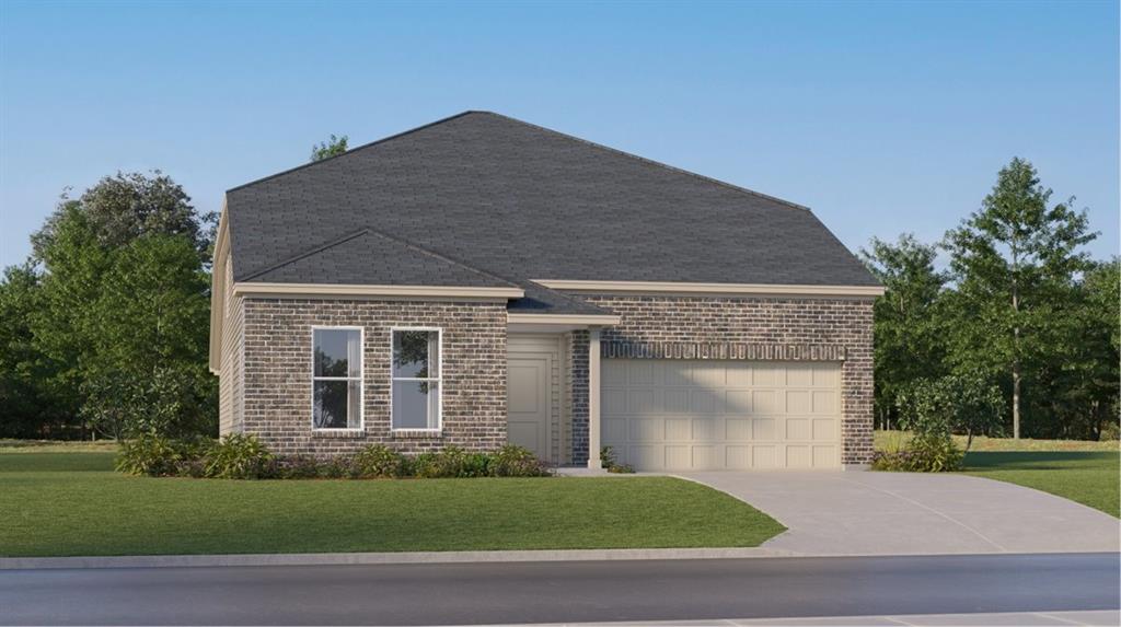 a front view of a house with a garden and yard