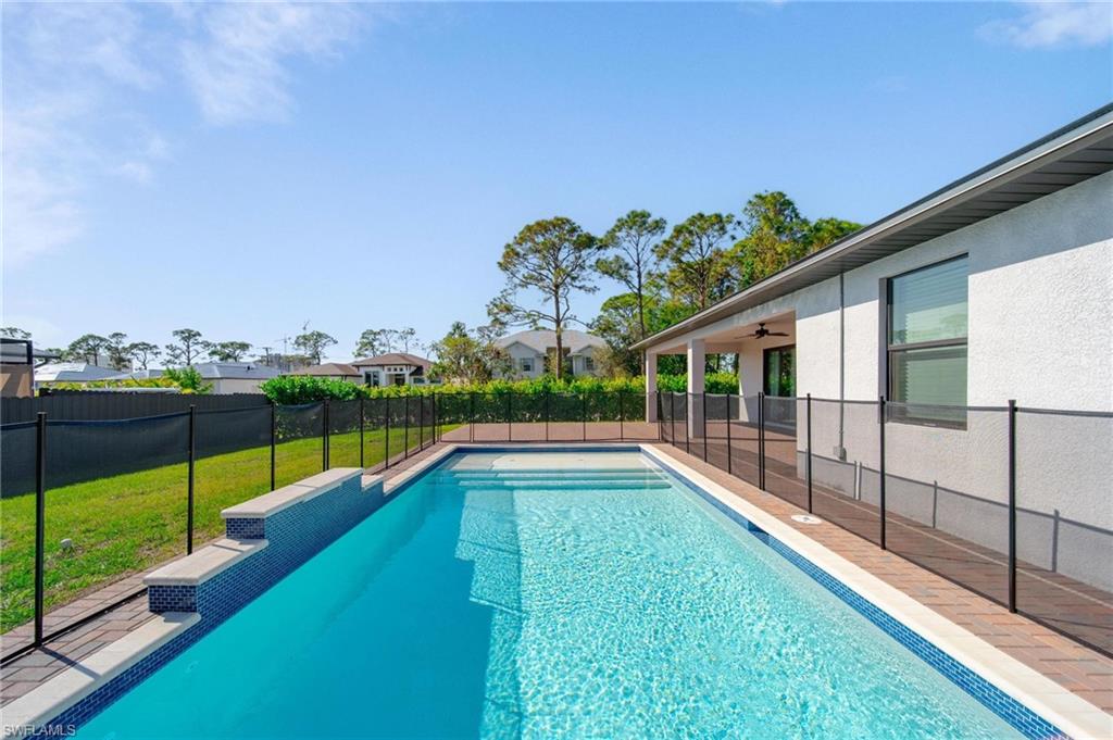 a view of swimming pool from a balcony