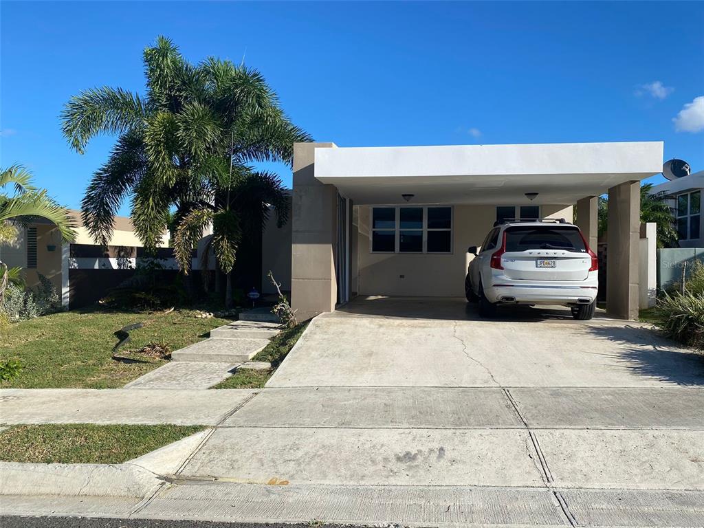 a car parked in front of a house