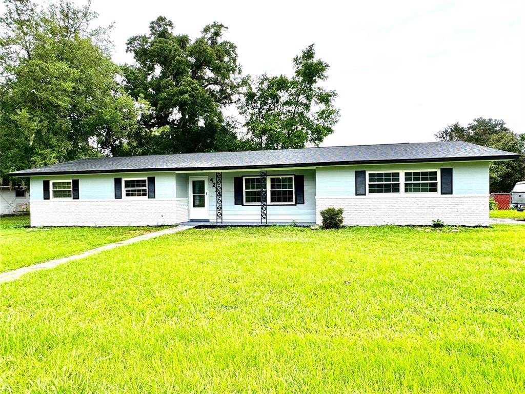 a view of a house with swimming pool