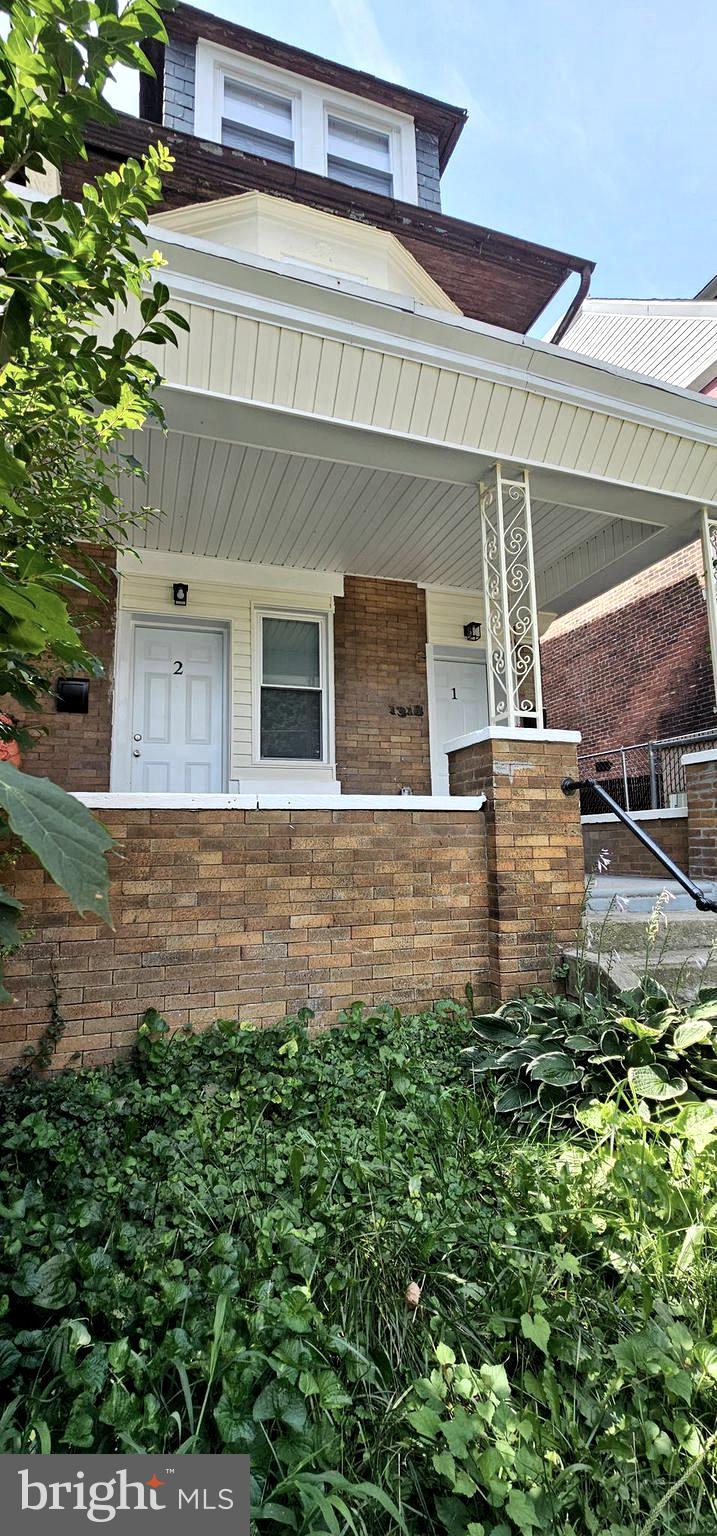 front view of house with a yard