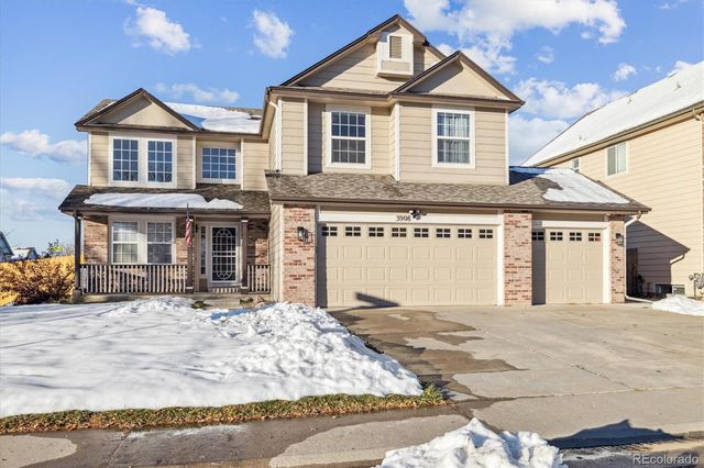 $614,999 | 3908 South Lisbon Way | Spring Creek Meadows