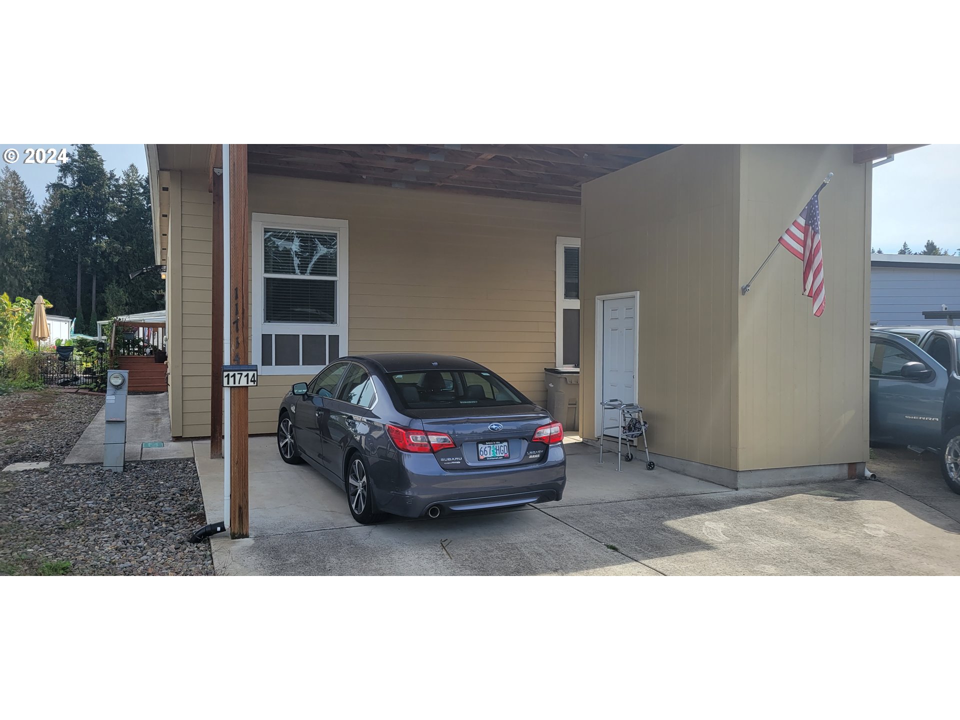 a car parked in front of a house