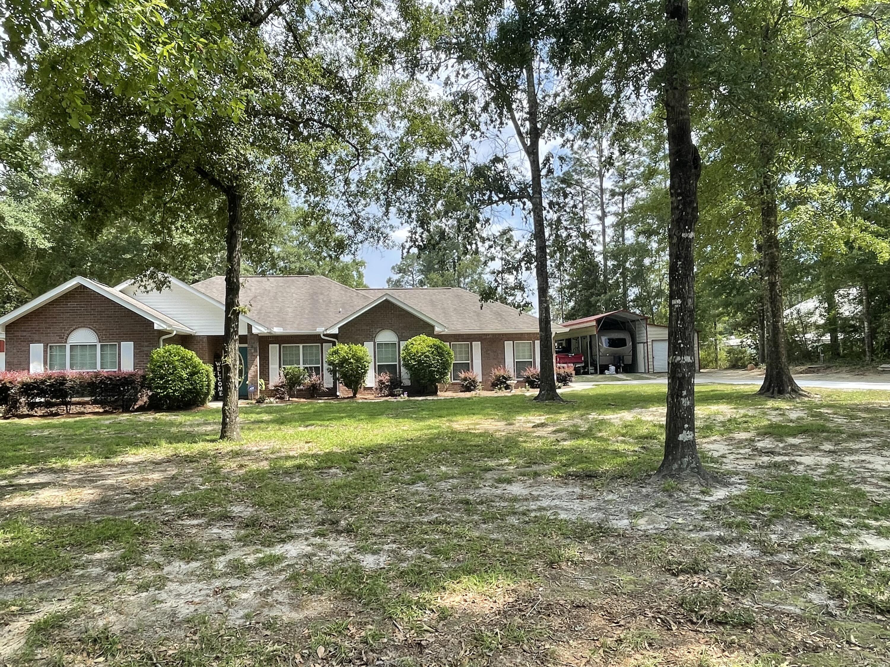 a house with trees in the background