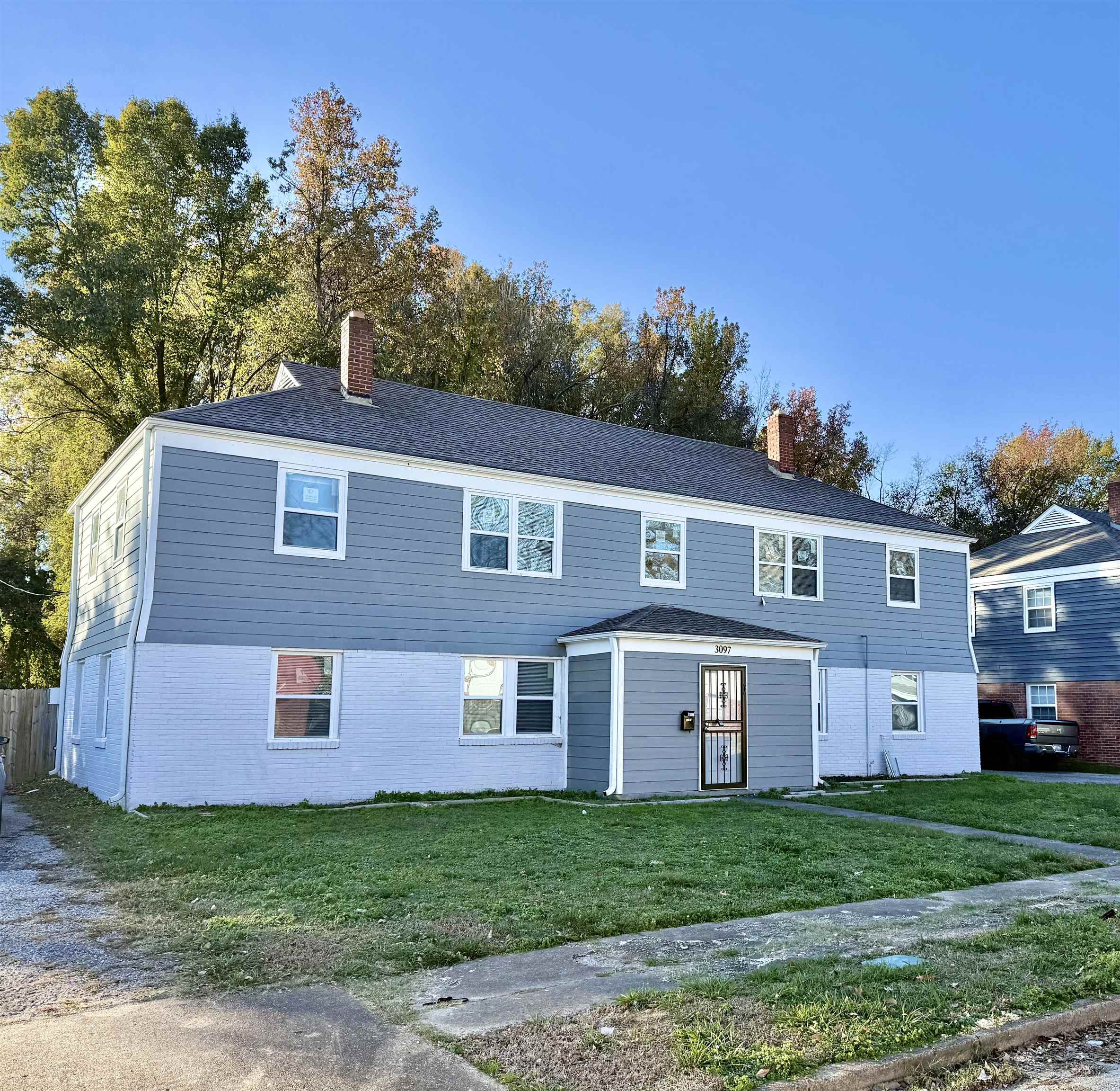 View of front of house with a front lawn