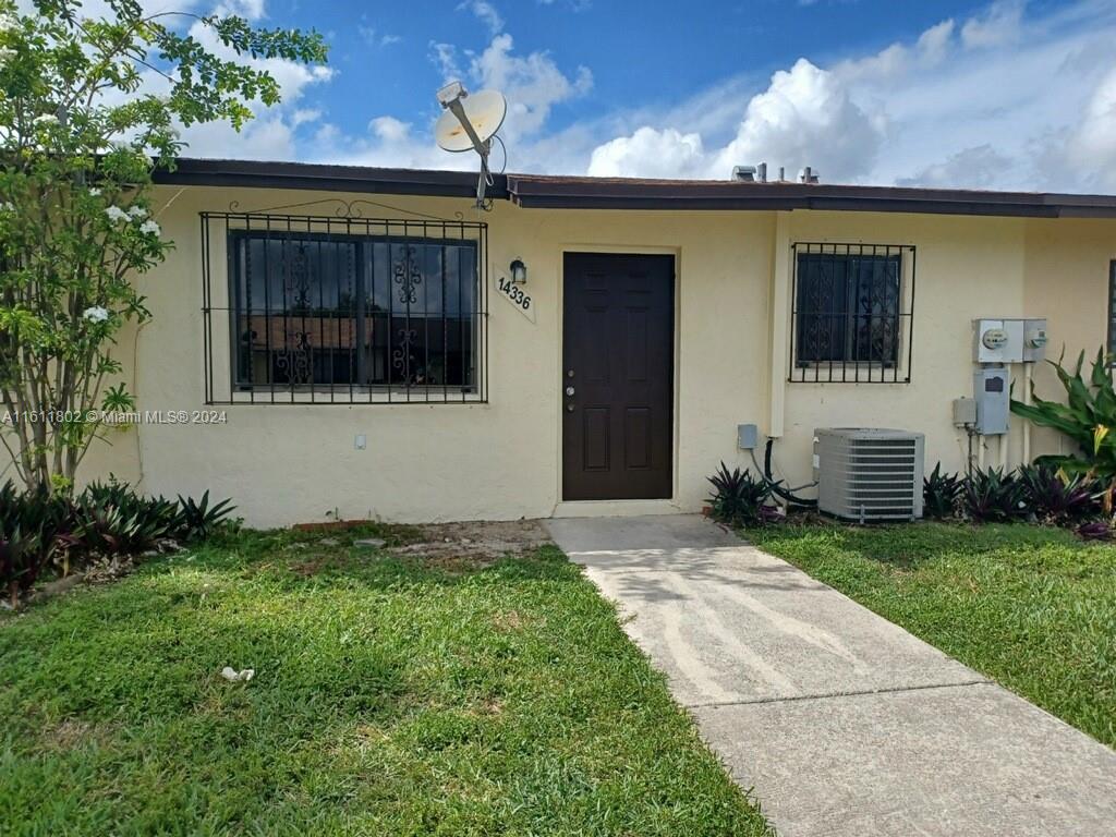 a front view of house with yard