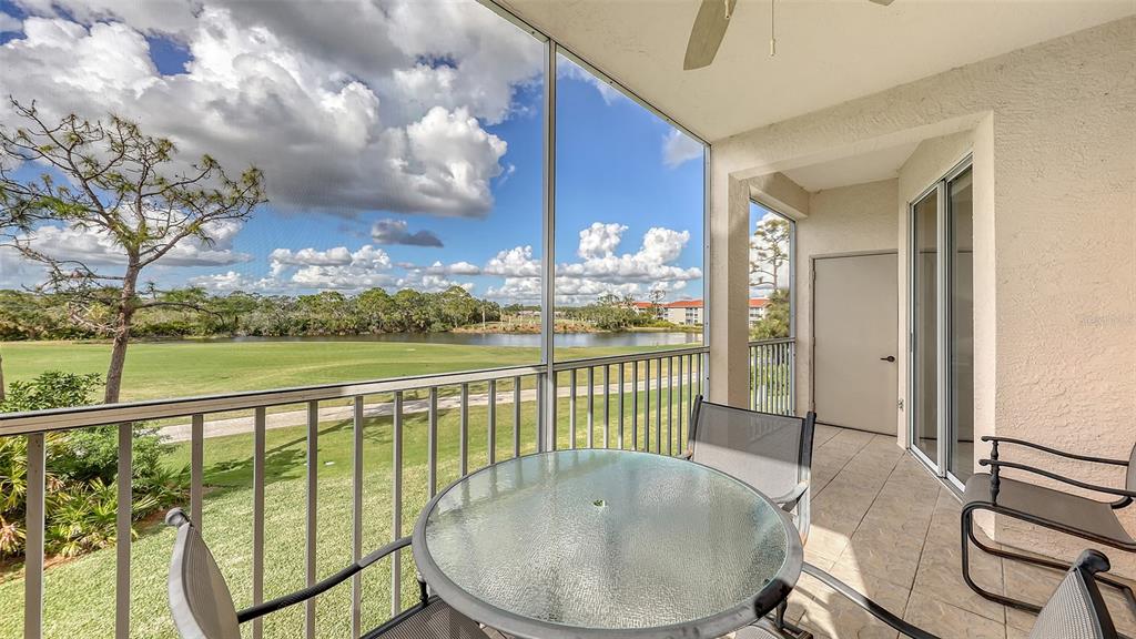 a view of a living room and balcony