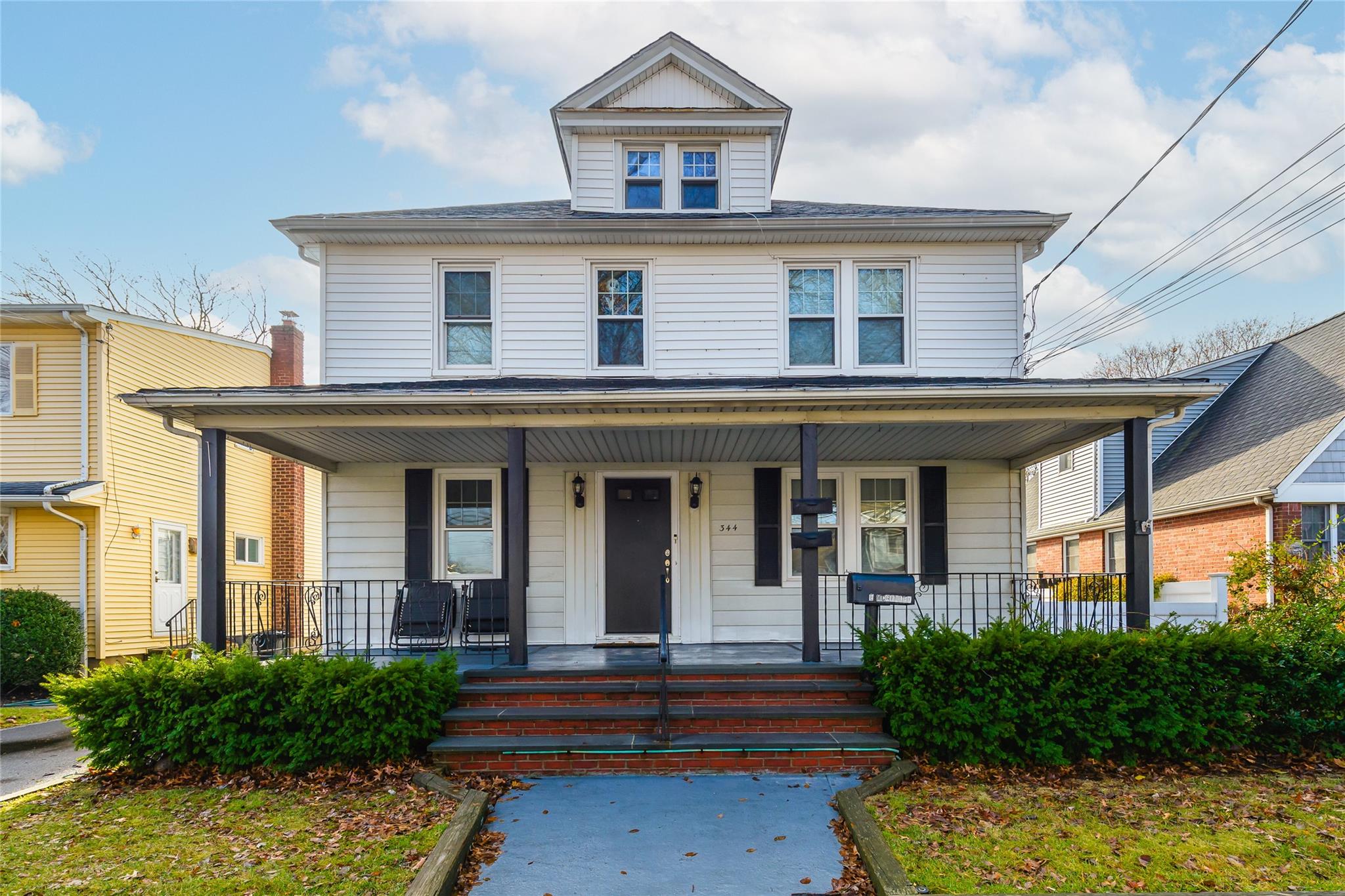 View of front of property with a porch