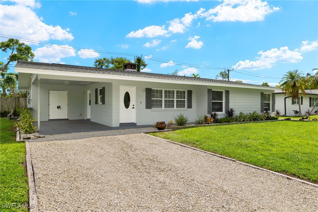 front view of a house with a yard