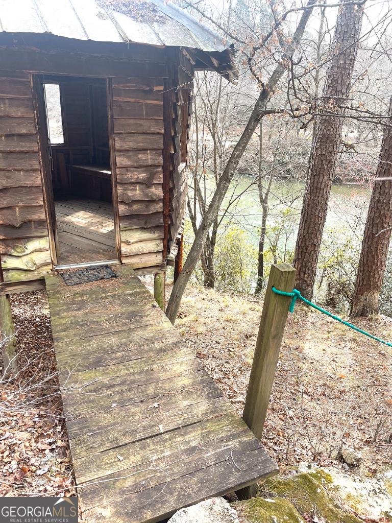 a view of a backyard of the house