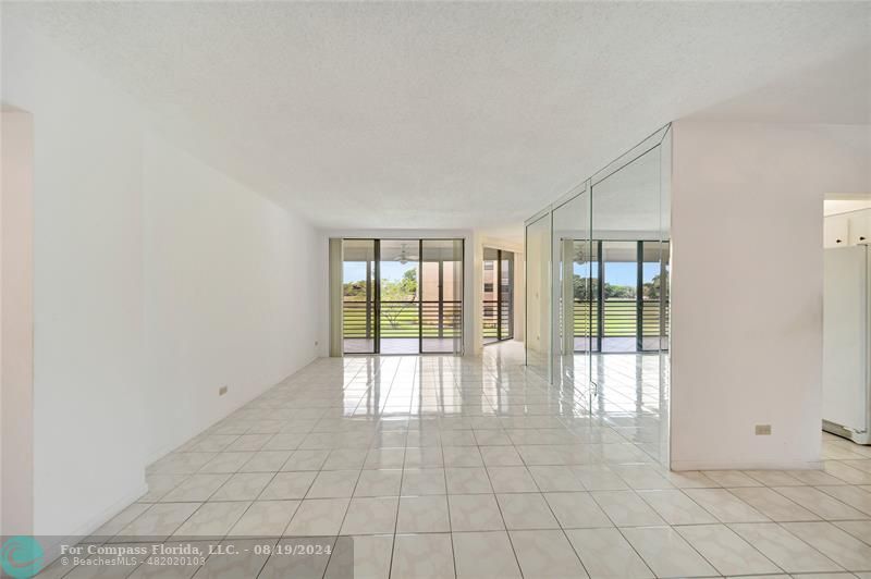 Spacious Living Room & Patio Doors to Screen Balcony