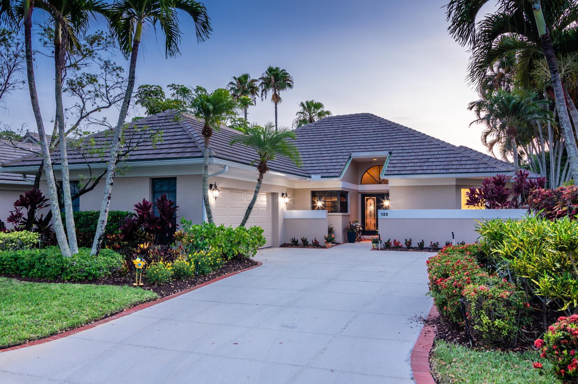 front view of a house with a small yard