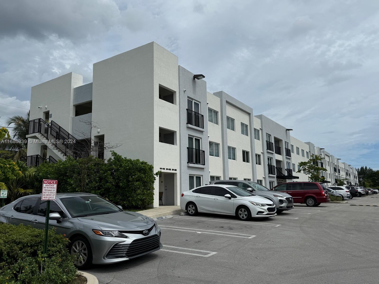 a car parked in front of a building