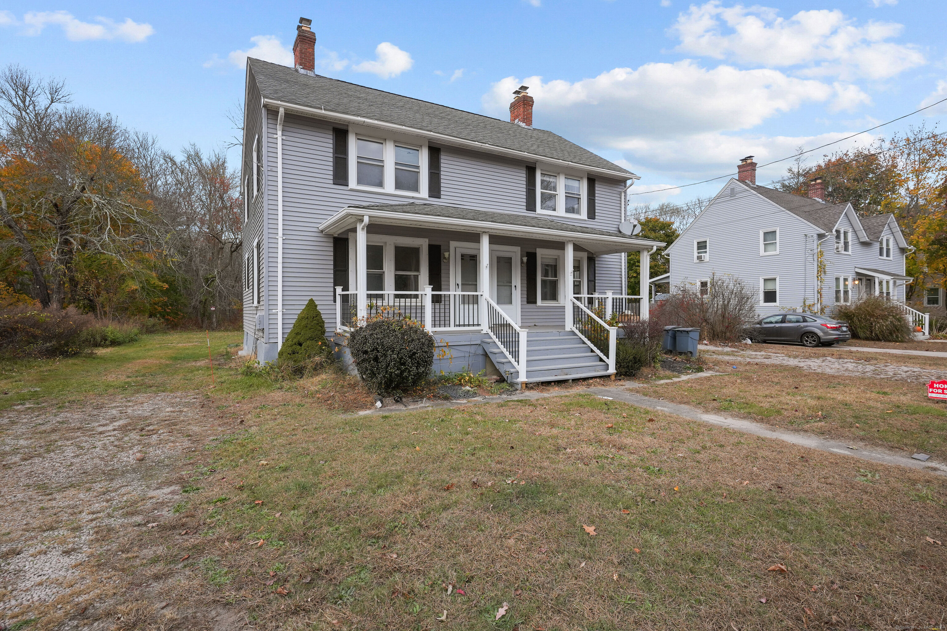 a view of a yard in front of a house