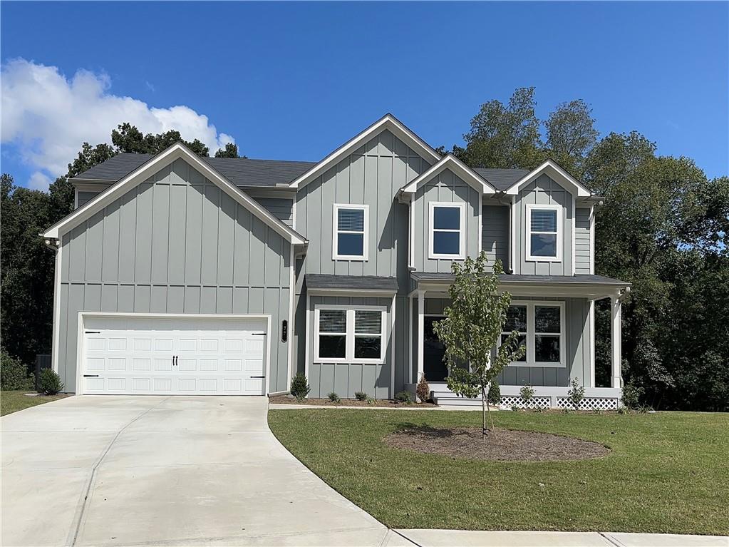 front view of a house with a yard