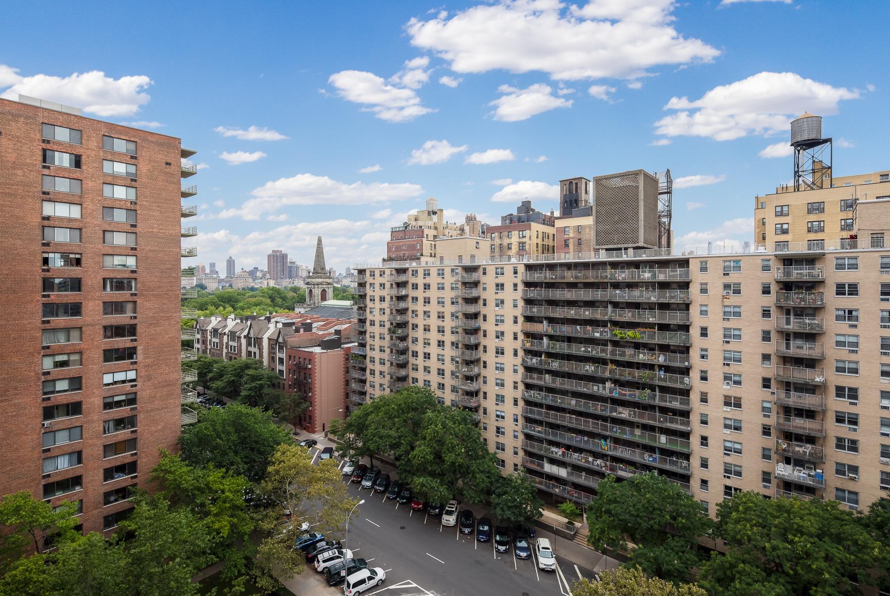 a view of a city with tall buildings