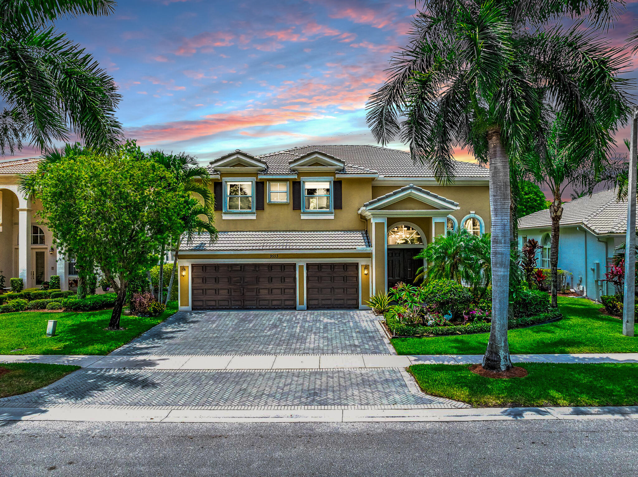 front view of a house with a yard