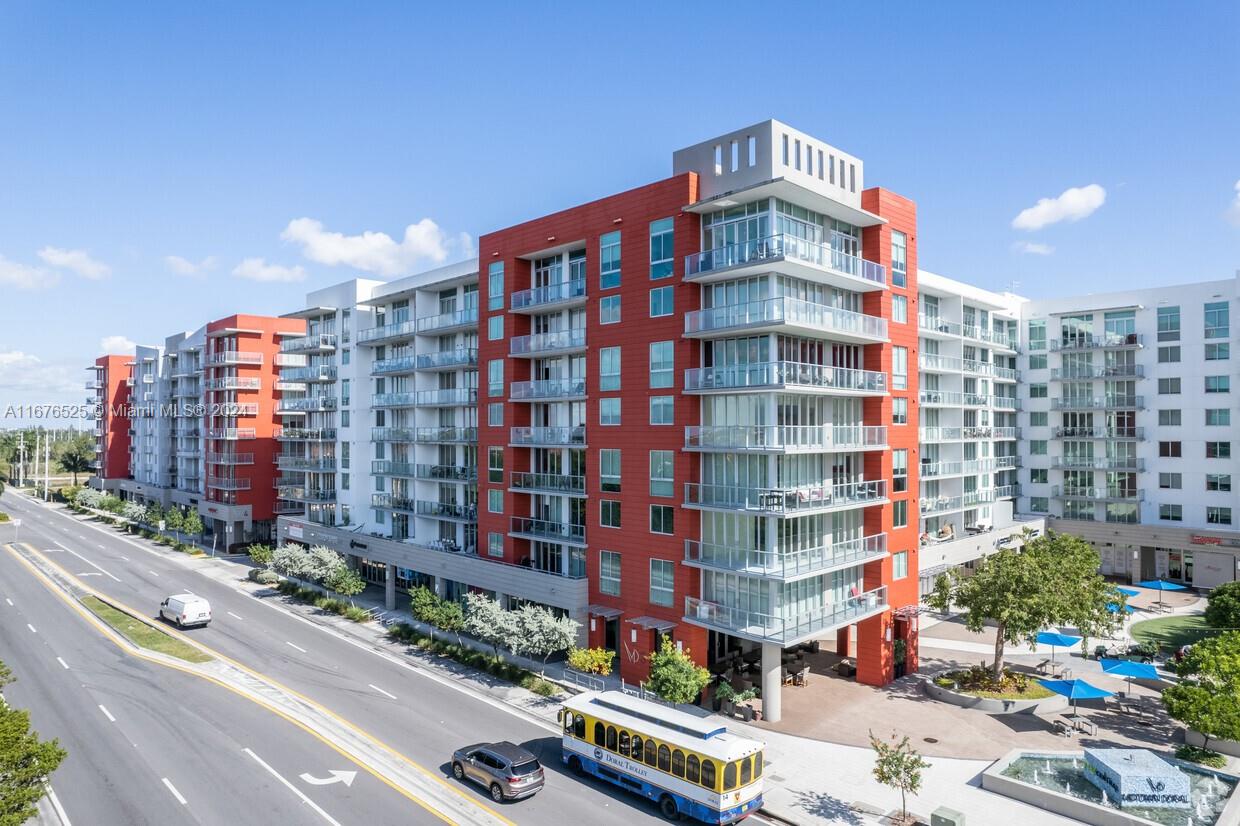 a tall building with a street view