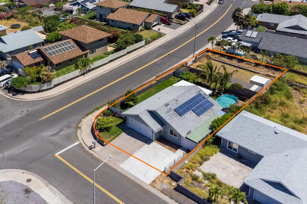 an aerial view of a house roof deck