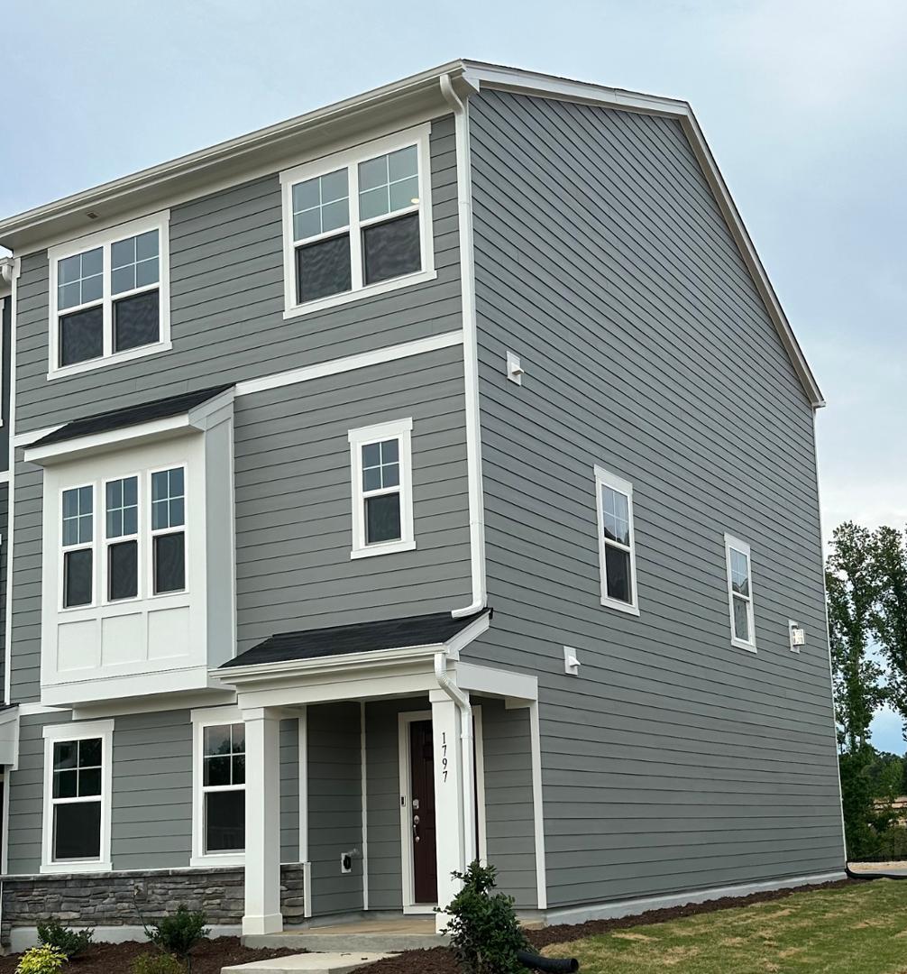 a front view of a house with stairs