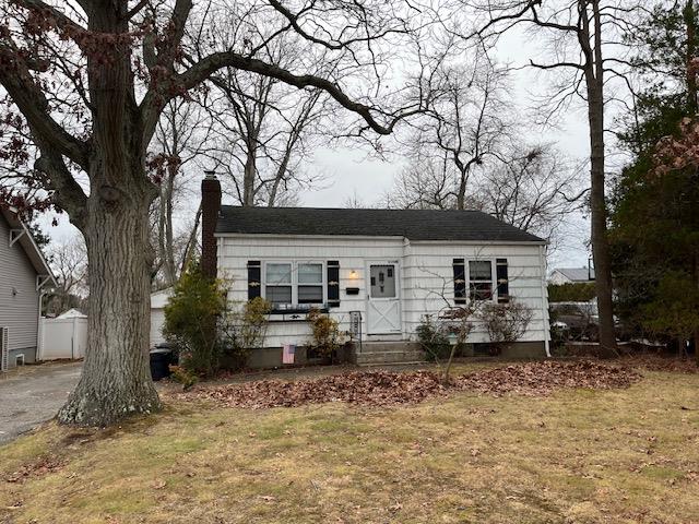 View of front of home with a front lawn