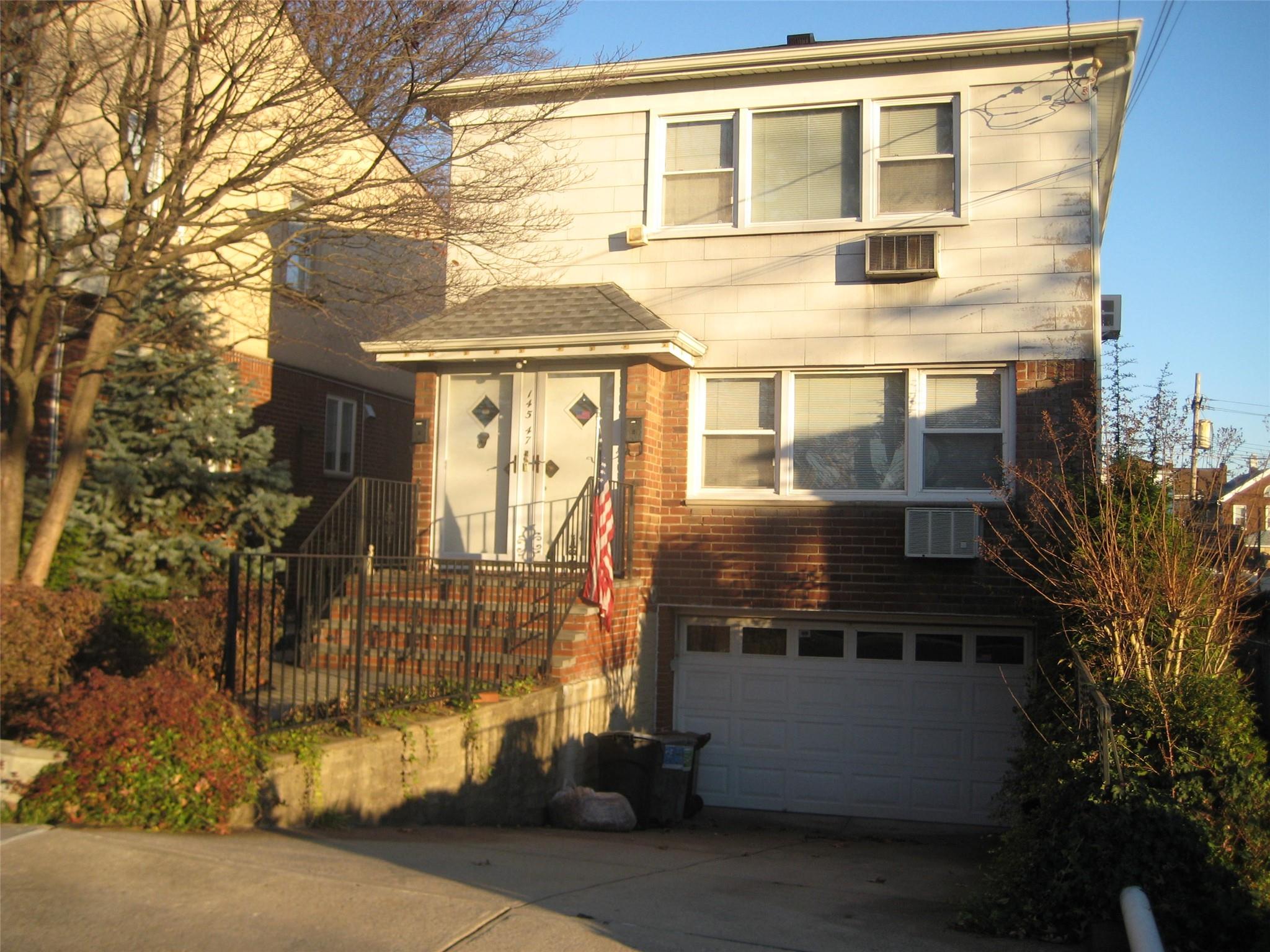 Front facade featuring a garage