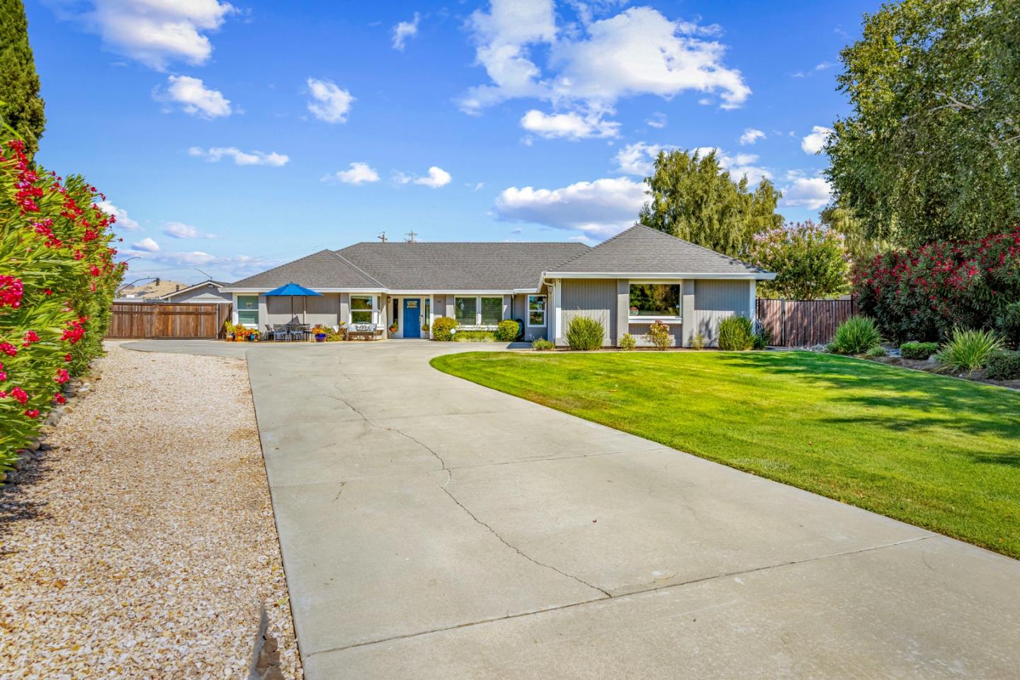 a view of a house with a big yard