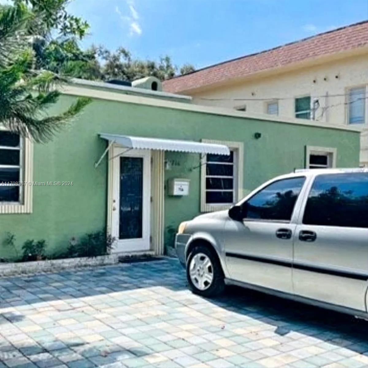 a car parked in front of a building