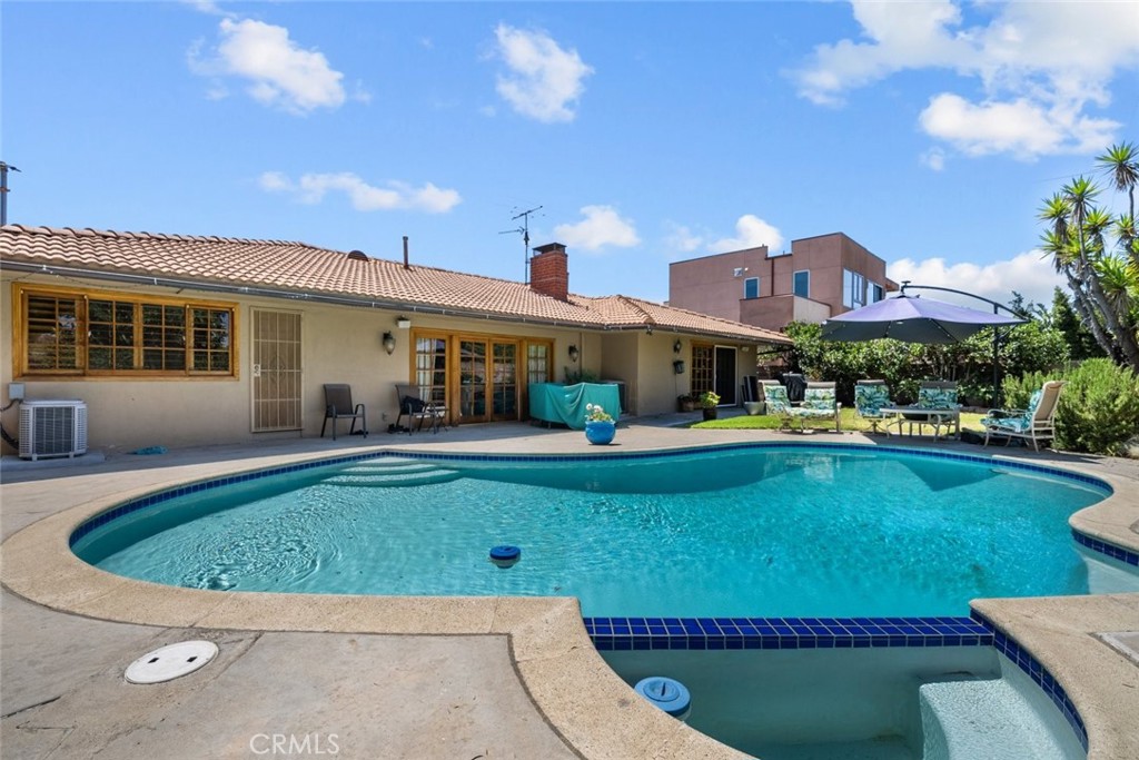 a view of a house with a swimming pool