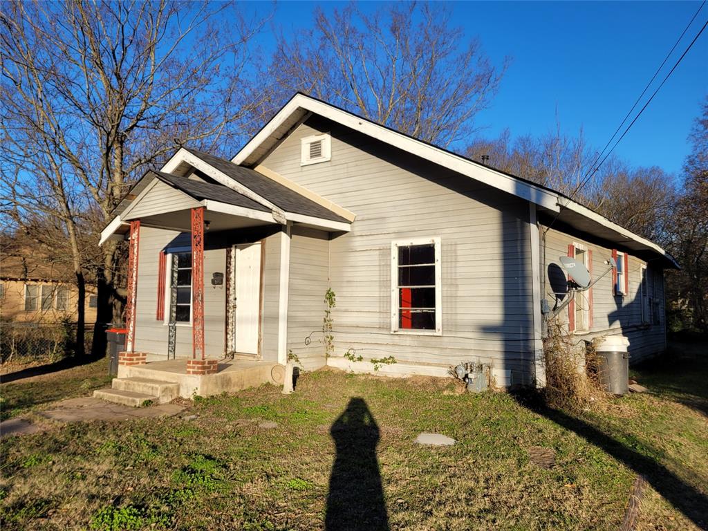 Bungalow-style home featuring a front yard