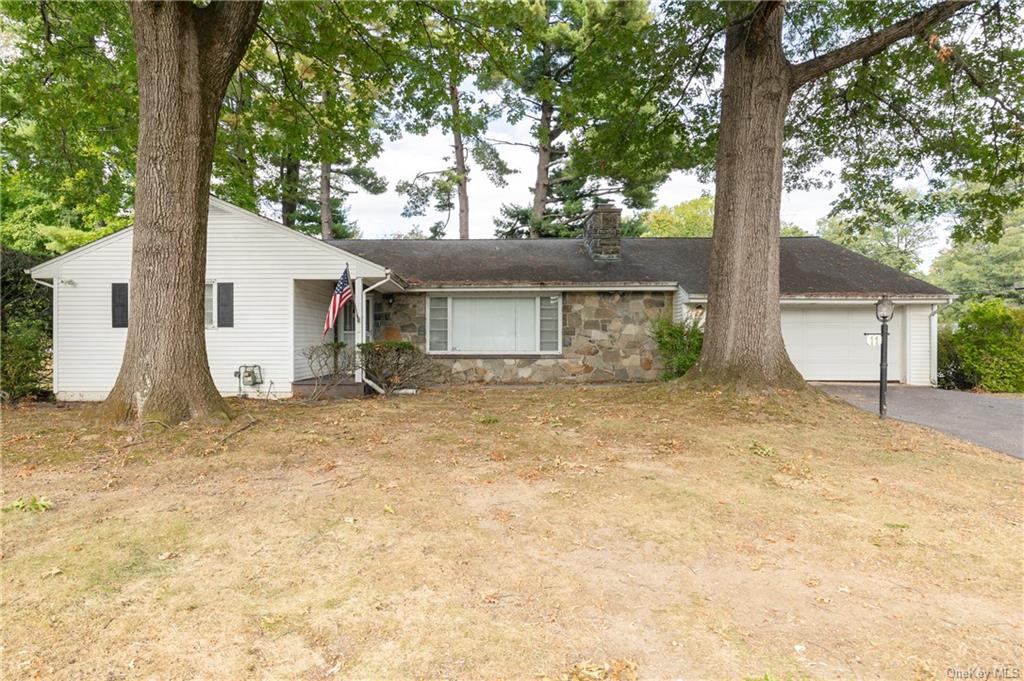 a house with trees in front of it