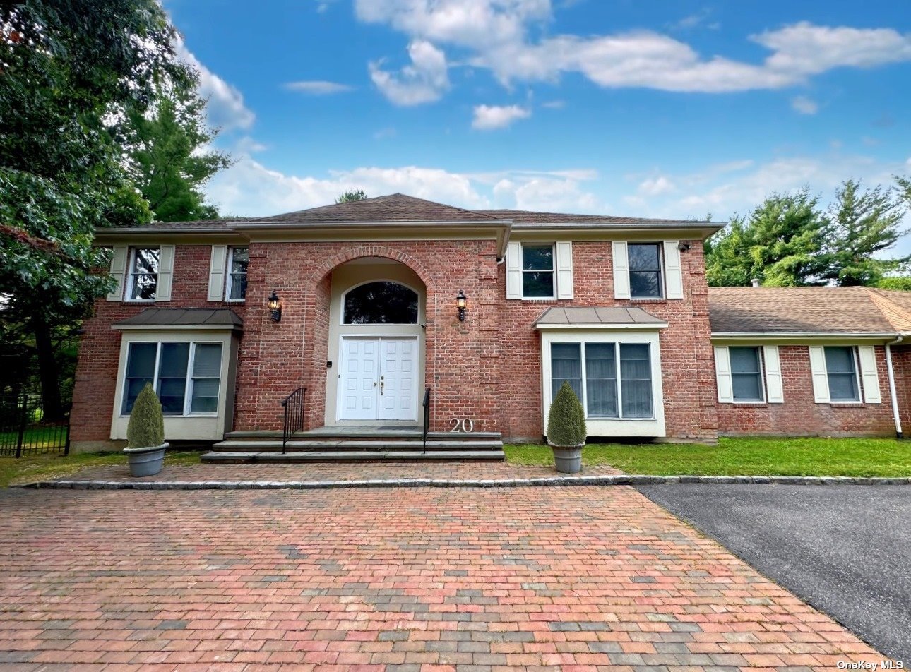 a front view of house with yard