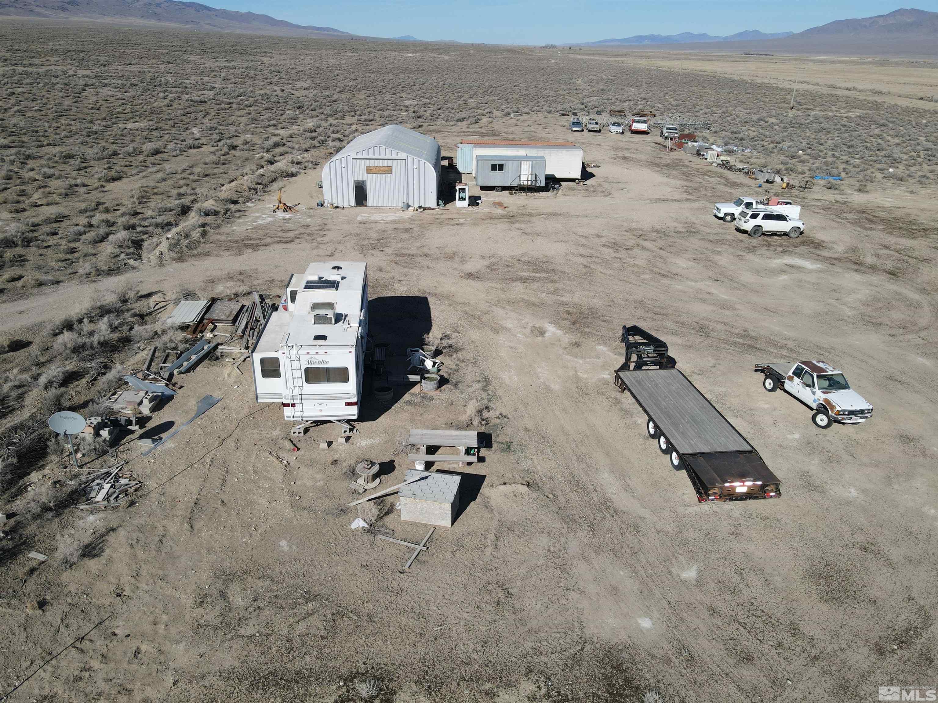 an aerial view of a house with outdoor space