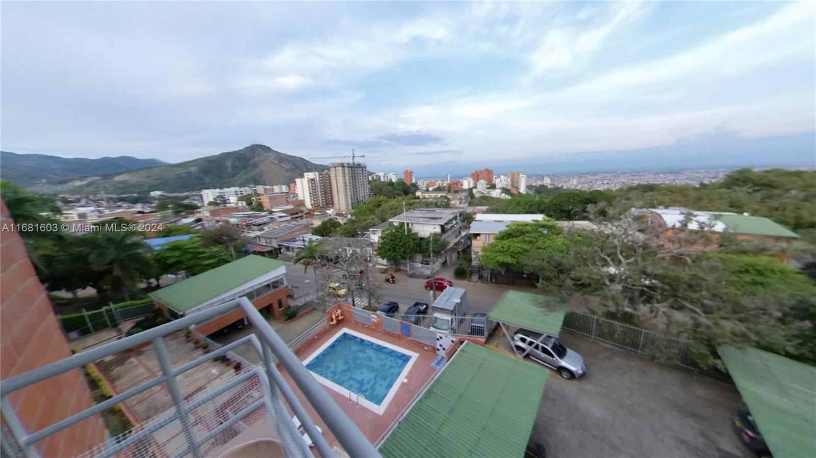 an aerial view of a house with a garden