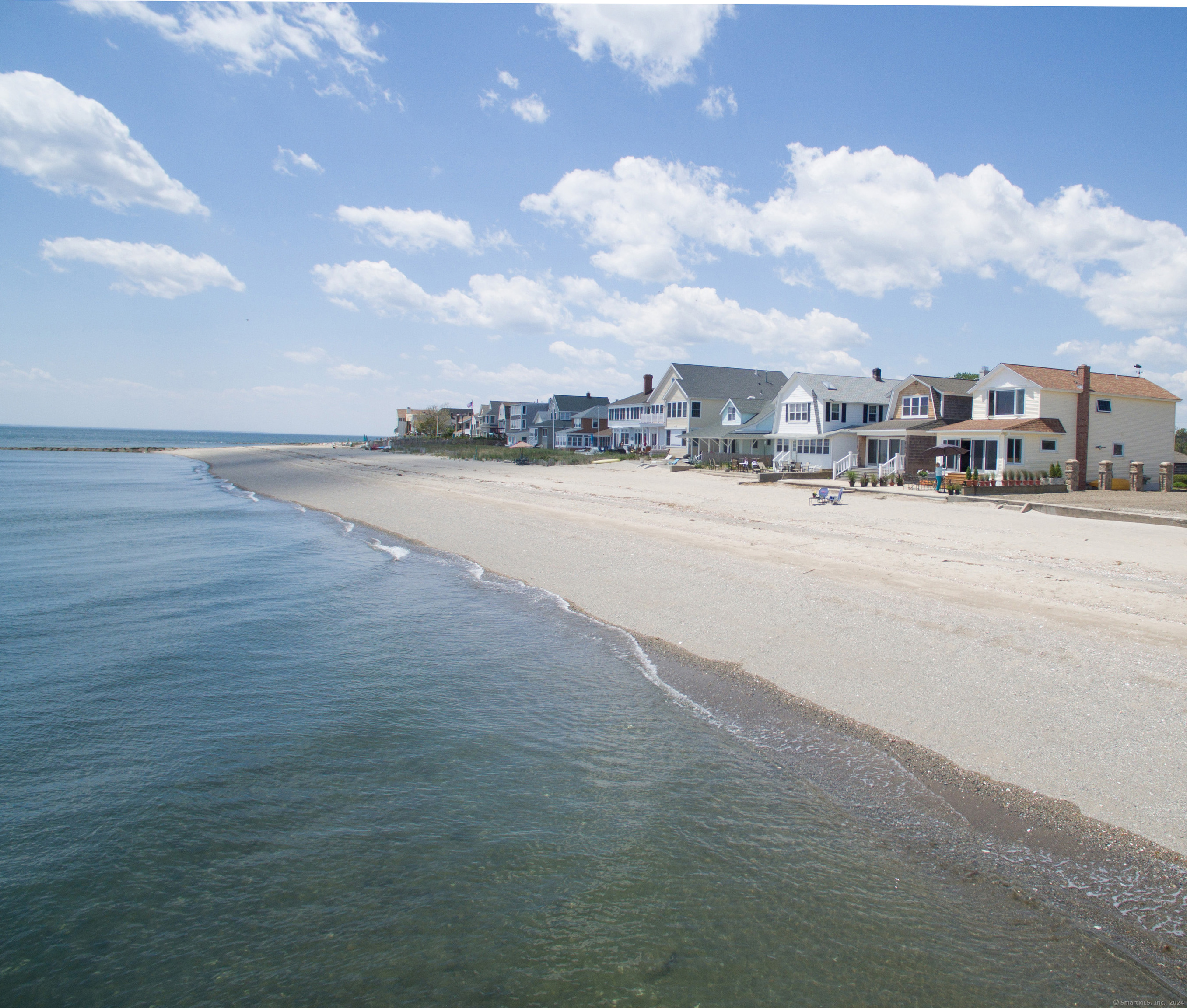 a view of an ocean and city