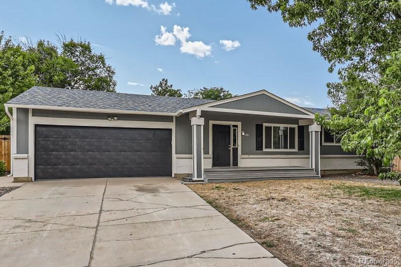 a front view of a house with a garage