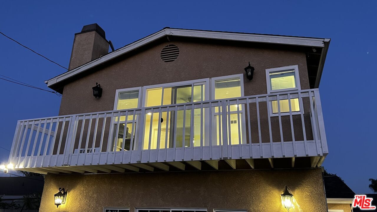 a front view of a house with balcony