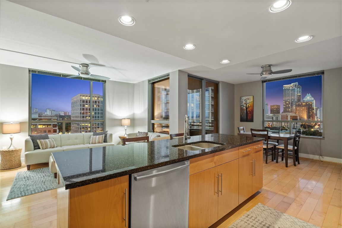 a very nice looking living room with dining room and couches