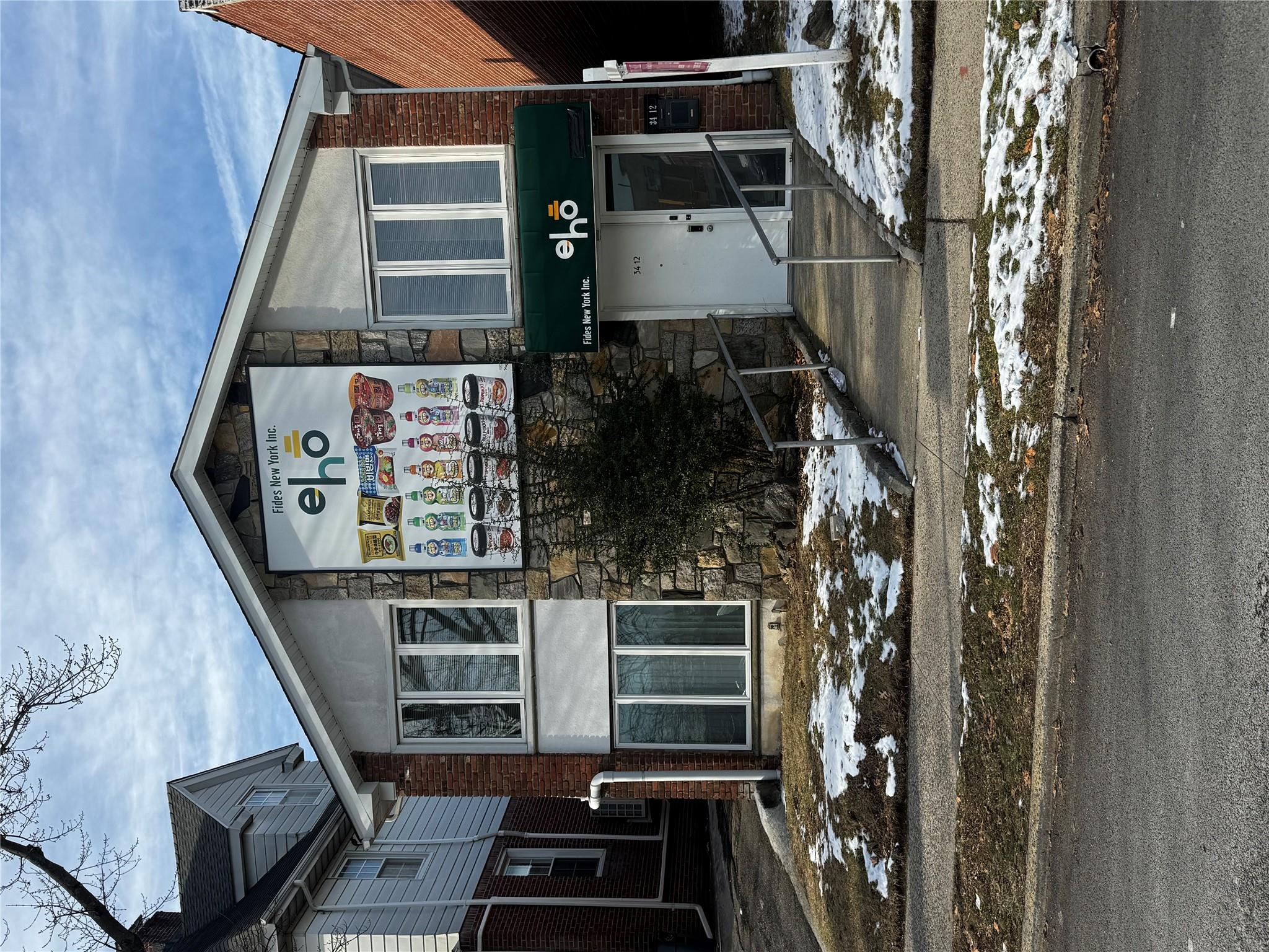 a front view of a house with street