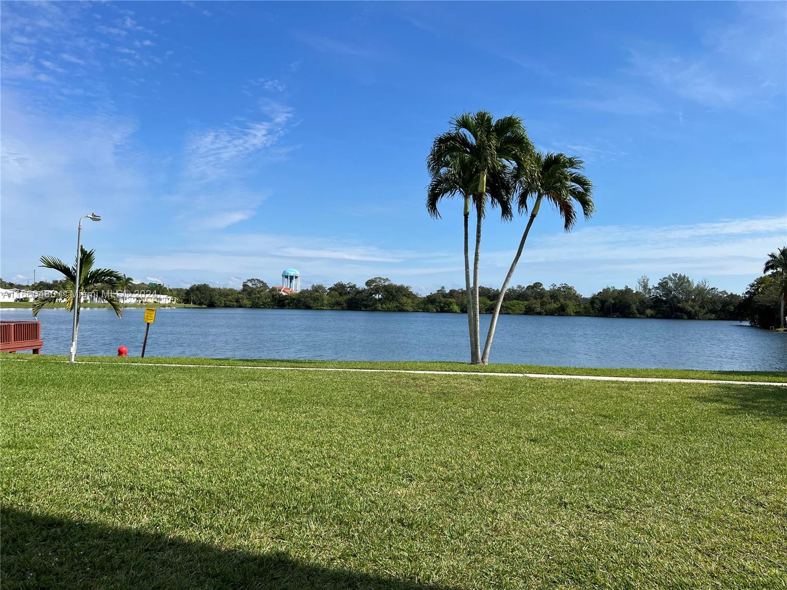 a view of swimming pool and lake