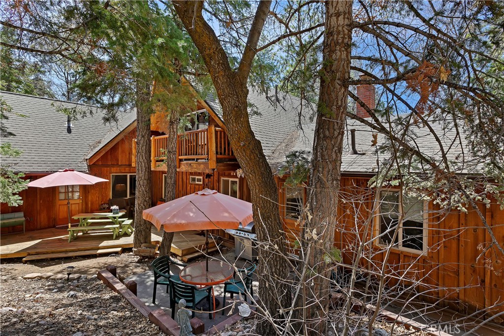 a view of a yard with an outdoor space