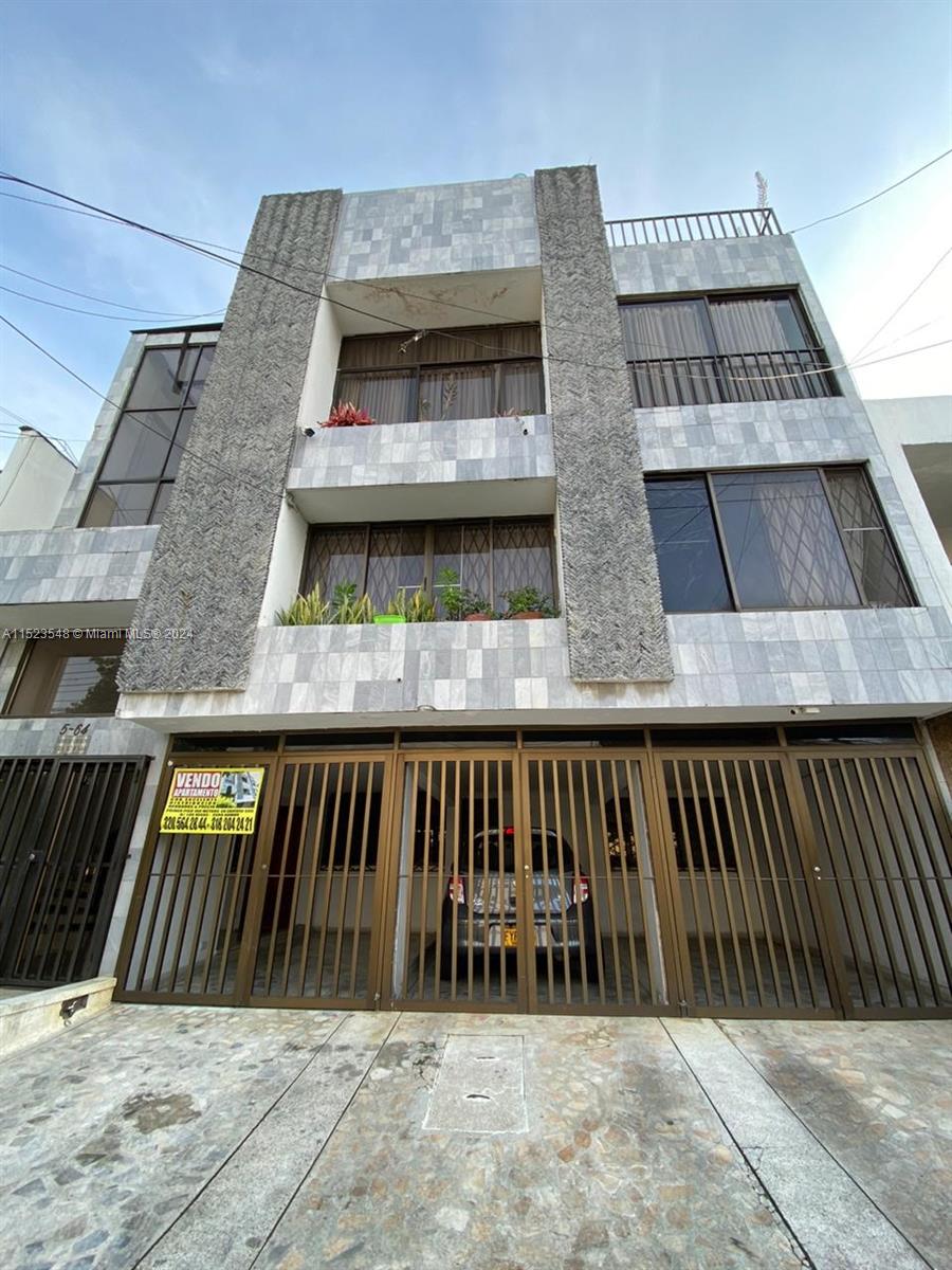 a view of outdoor space with deck and barbeque oven